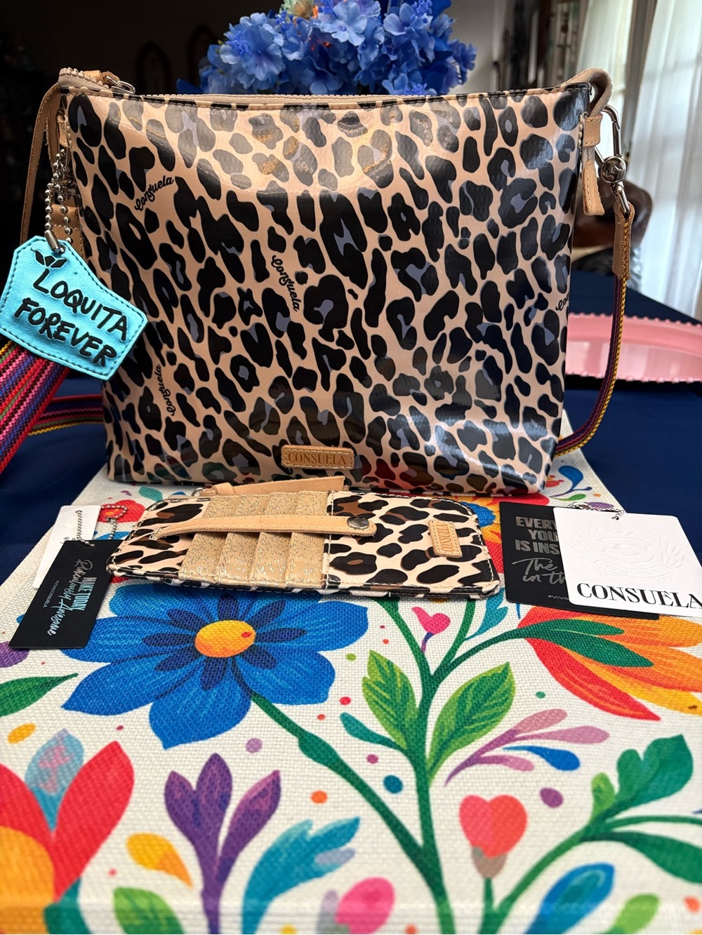 Consuela Leopard-Print Crossbody in Tan and Black with Colorful Strap Charm